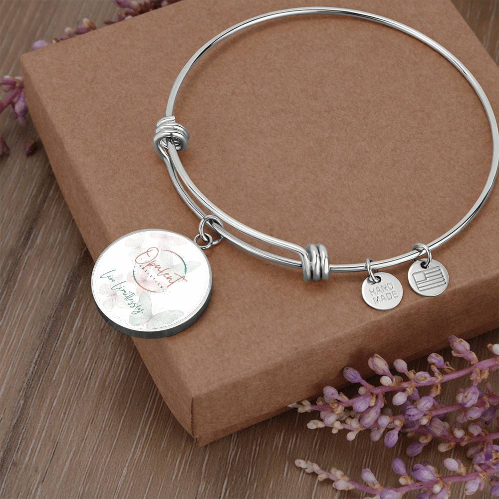 Opulent Bangle - Butterfly Logo